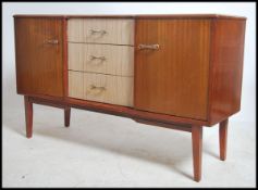 A retro 1960's Danish influence sideboard in teak