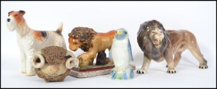 A collection of ceramic animals to include a 19th