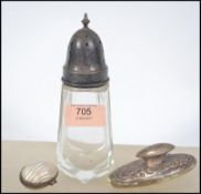 A silver and cut glass silver hallmarked sugar cas