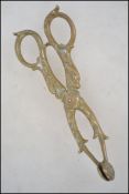 A pair of 19th century brass sugar nips. The handl