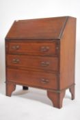 An Edwardian mahogany inlaid bureau writing desk.