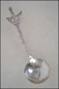 A  Malaysian - Asiatic silver teaspoon each with a