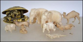 A collection of vintage ivory and bone items to in