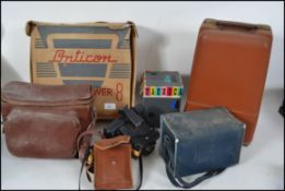 A collection of circa 1950s cameras and photograph