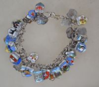 A silver continental charm bracelet adorned with m