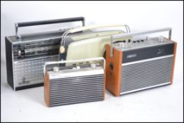 A collection of four retro / vintage transistor ra