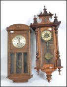 An early 20th century vienna regulator wall clock