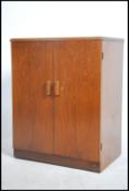 A vintage mid century HMV record cabinet complete