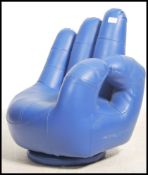 A retro 20th century style leather blue swivel chi