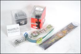 A cased vintage Swatch 007 wristwatch together wit