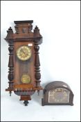A 19th century walnut vienna regulator wall clock