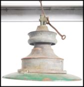 An early 20th century Industrial enamel painted tw