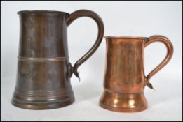 A 19th century pewter tankard by Thomas Law having
