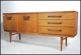 A 1970's teak wood beautility Danish influence sid