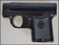 A vintage 20th century bakelite Pistoquet lighter.