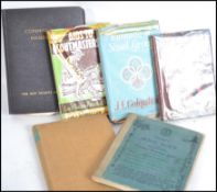 A collection of vintage 20th century Scout books including examples featuring Baden Powell