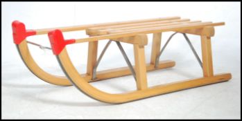 A retro 20th century wooden slated  West German ma