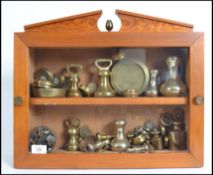 A fantastic collection of vintage brass weights da