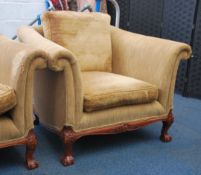 A good pair of antique style armchairs raised on c