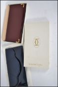 A vintage boxed Cartier evening / clutch bag withi
