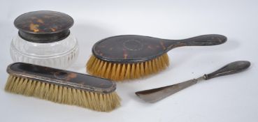 A silver hallmarked tortoiseshell dressing table s