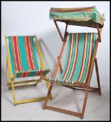 2 vintage 20th century deck chairs, each with vibr
