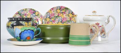 A vintage Shelley bowl together with a Bretby green glaze bowl, Grey's Art Deco cup and Saucer,