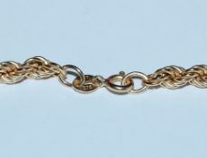 A hallmarked 9ct gold rope twist chain necklace. I