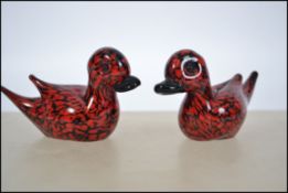 A pair of 20th century studio glass Murano sculptu