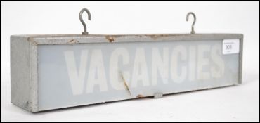 A vintage / retro double sided illuminated VACANCI