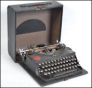 A vintage 20th century cased Imperial typewriter w