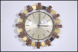 A mid century retro Metamec ' Aztec ' wall clock h