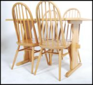 A set of 4 Ercol style hoop back dining chairs bei