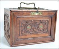 An early 20th century wooden  cased Mah Jong set,