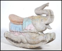 A 20th century carved hardwood childs rocking elep