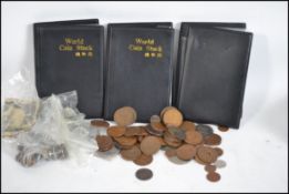 A collection of coins from around the world to include Georgian, Victorian etc. Please see images.