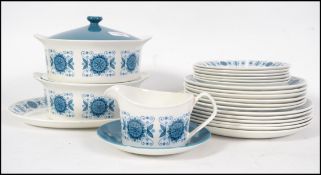 A retro 1960's / 70's dinner service decorated wit