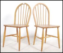 A pair of 1970's Ercol hoop back Windsor dining ch