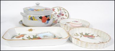 A stunning contemporary large Italian lidded casserole dish with matching liner together with a