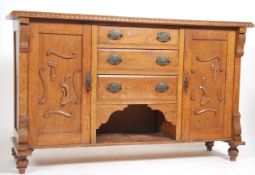 A 1920's Arts & Crafts revival sideboard dresser b