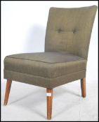 A good 1960's retro open armchair raised on square