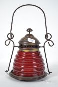 A stunning vintage red glass and brass lantern the