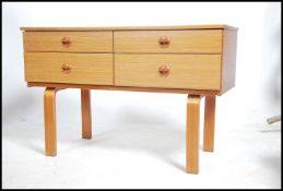 A retro 20th century teak wood four drawer sideboa