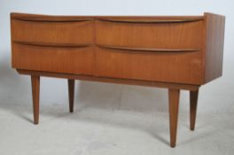 A 1970's low teak wood chest sideboard having tape