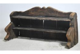 A believed 16th century elm wood dresser top galle