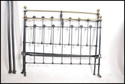 A late Victorian ebonised  cast iron and brass dou