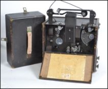 A vintage pre war possibly military portable cinem