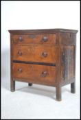An 18th century country oak bachelors chest of dra
