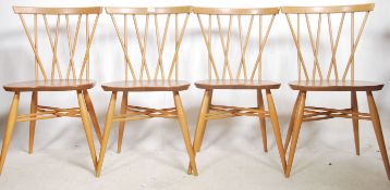 A set of four fantastic vintage  mid 20th Century Ercol Windsor beech and elm cross back candlestick