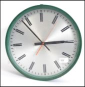 A mid century retro school / factory wall clock in